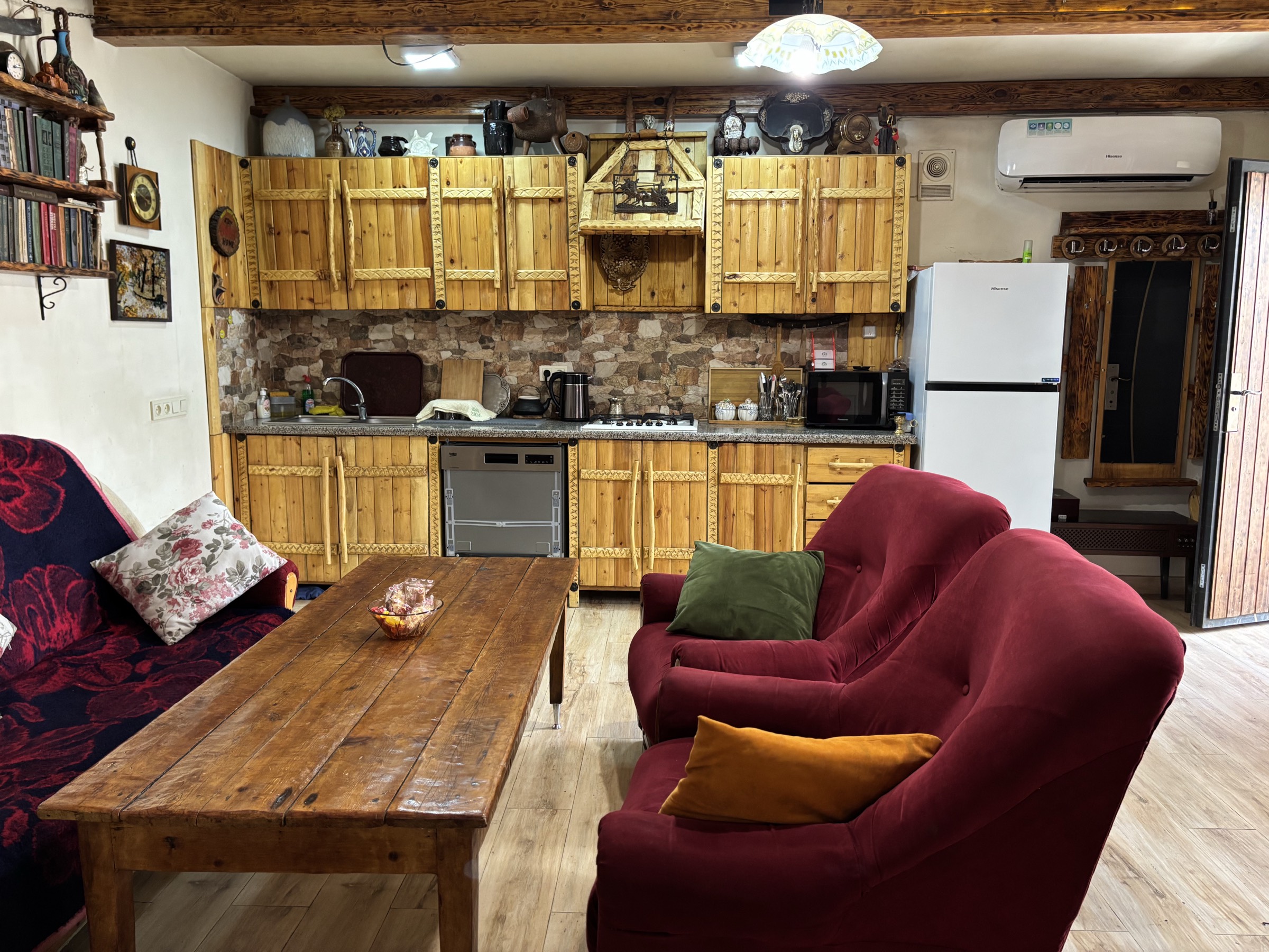 The kitchen with hand-made wooden cabinets